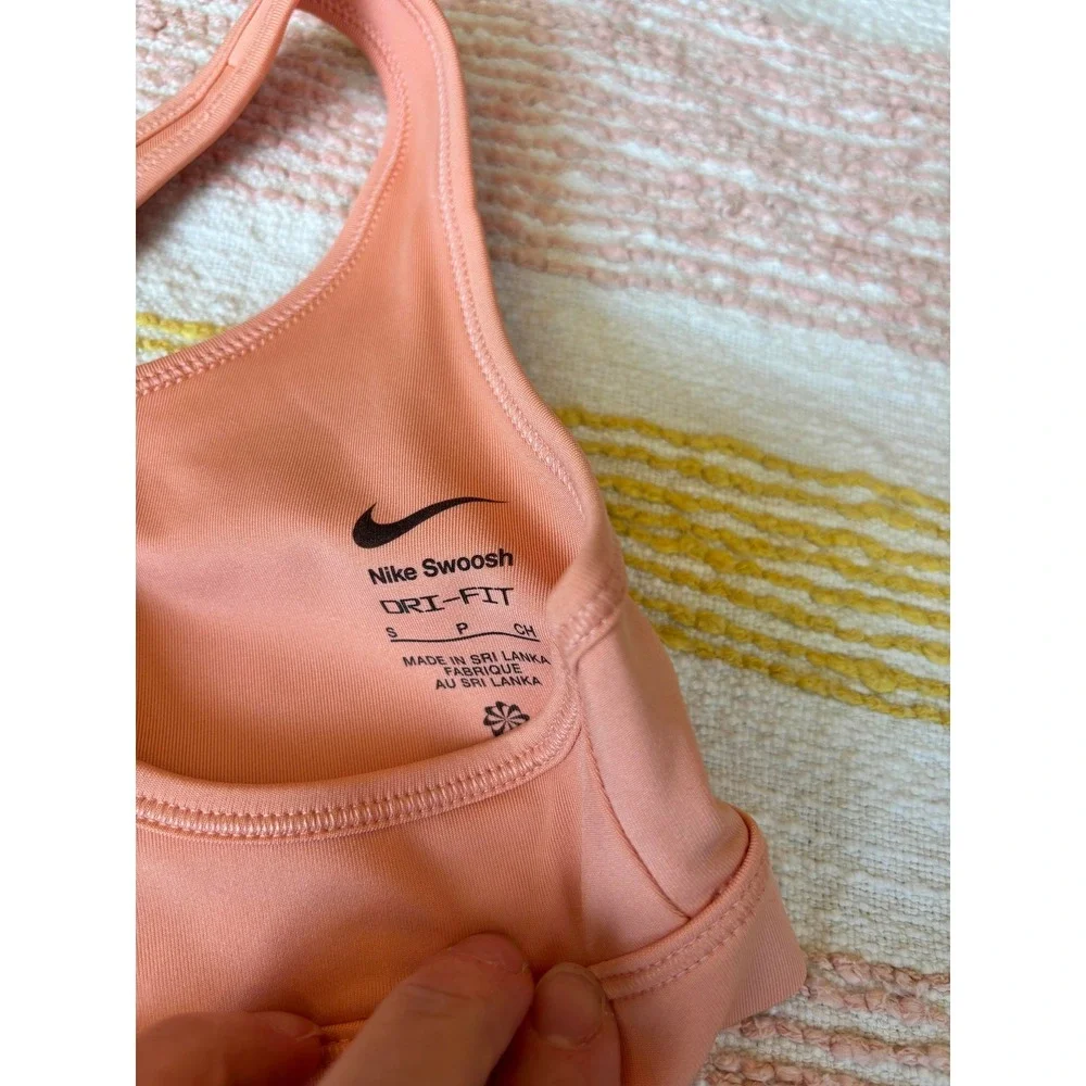 Nike‎ Girls Small Peach Coral Swoosh Dri-FIT Racerback Sports Bra Small NWOT